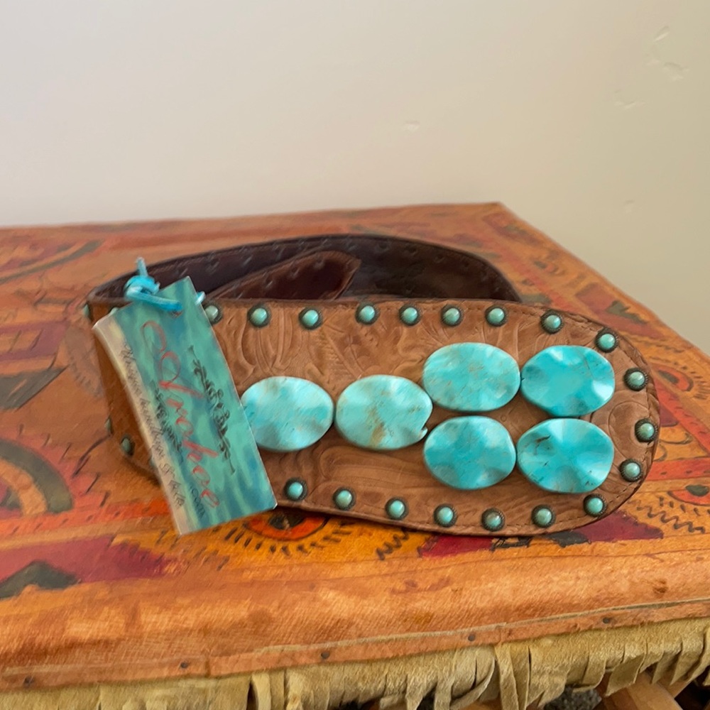 Turquoise leather belt.